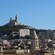 The Romanesque Marseille Cathedral perched on a hill overlooking the port of Marseille